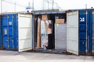 Are the rental containers weatherproof or suitable for outdoor storage?